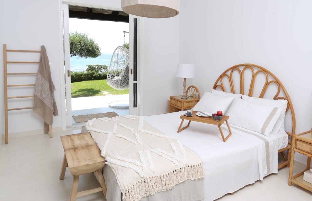 Seafront Calista Beach House with Garden