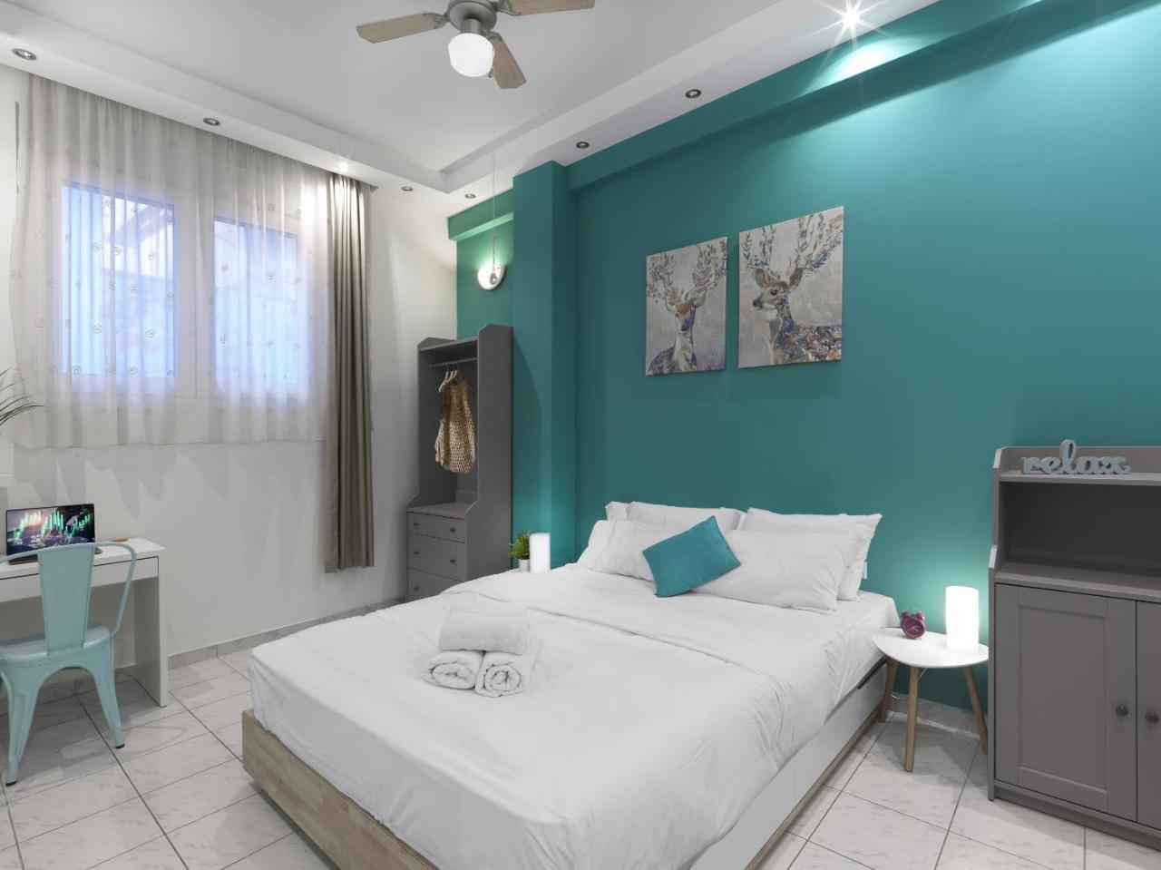 The Acropolitan · Your Home Under the Acropolis