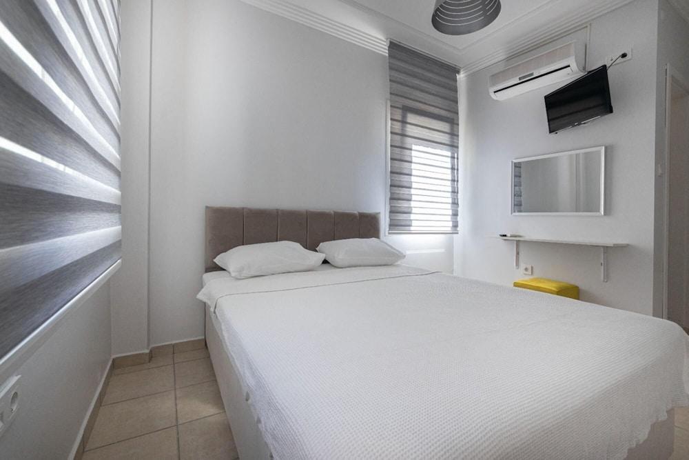 Comfy Room with Shared Pool Near Gumbet Beach